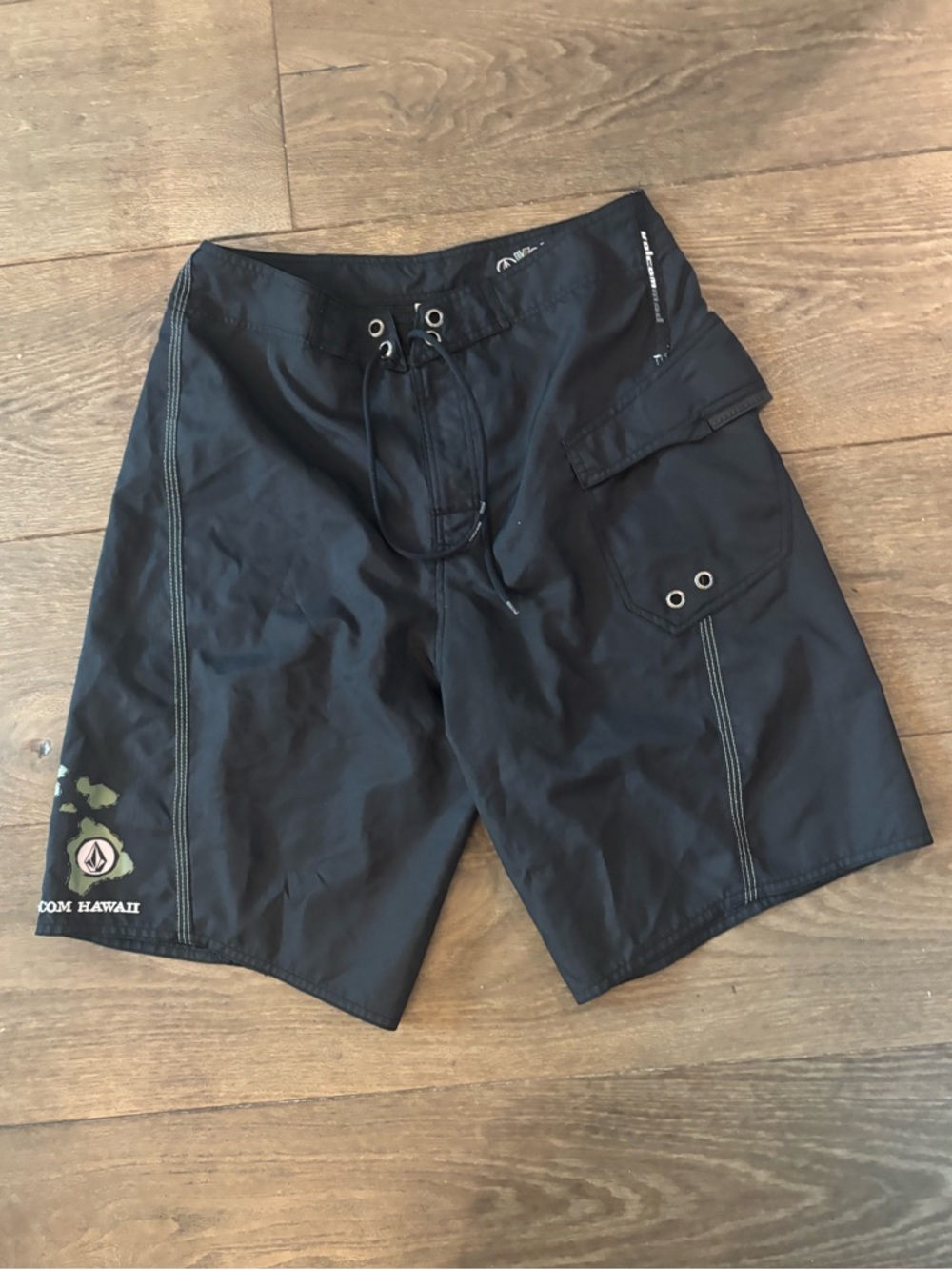 Vintage Volcom limited Hawaii edition board shorts with green Logo Stitching.